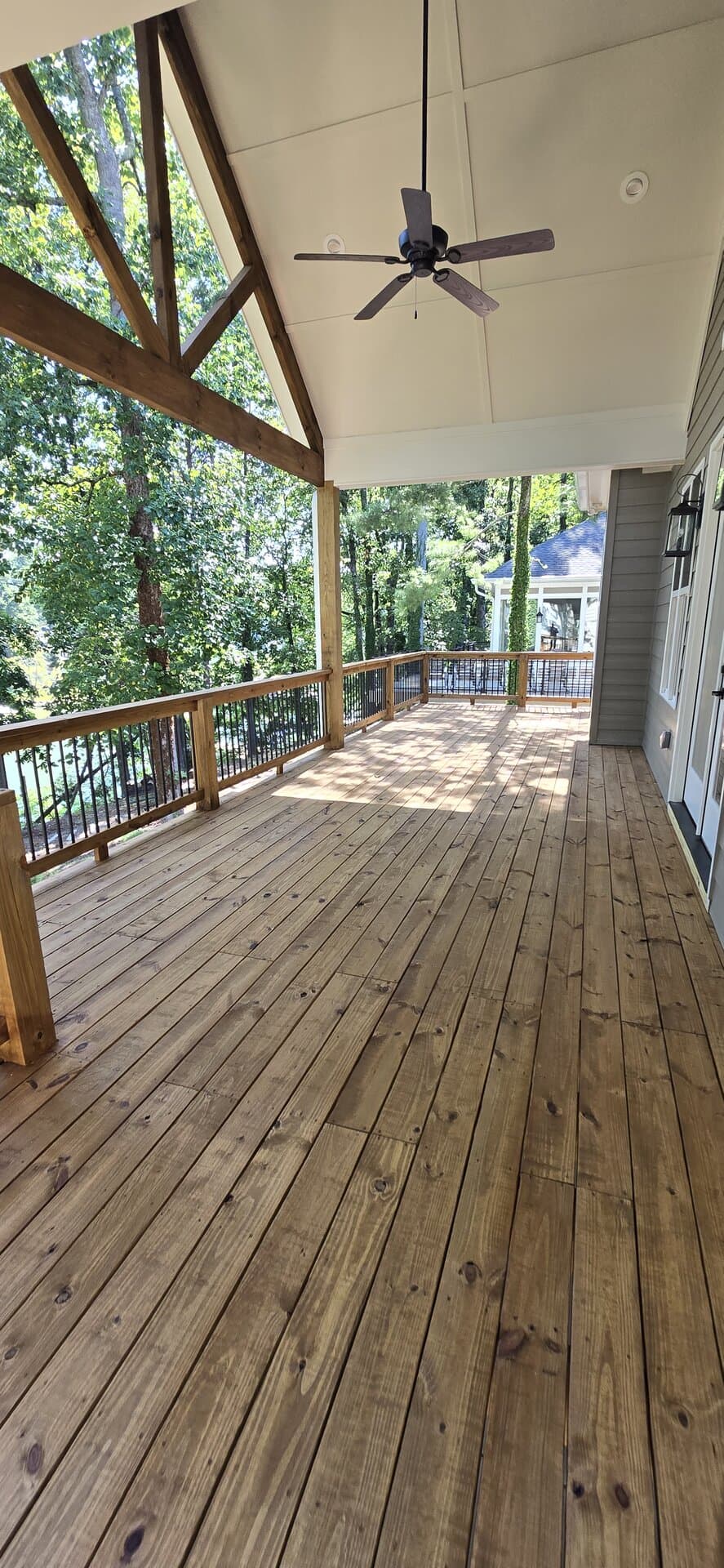 Premium covered deck with stained timber-frame ceiling in North Atlanta